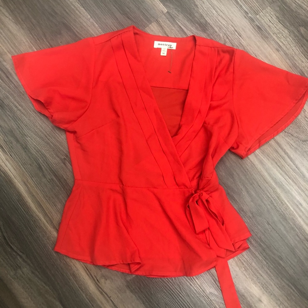 Flattering wrap blouse.
